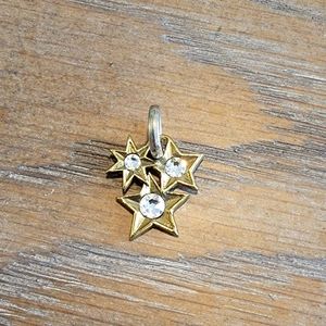 Waxing Poetic stars charm with silver, brass and Kristal Crystal's. Three stars.
